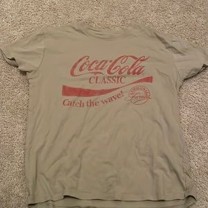 Junior Coca-cola shirt.